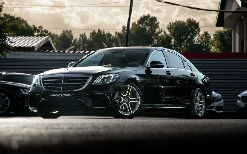 Black Mercedes S-Class luxury saloon
